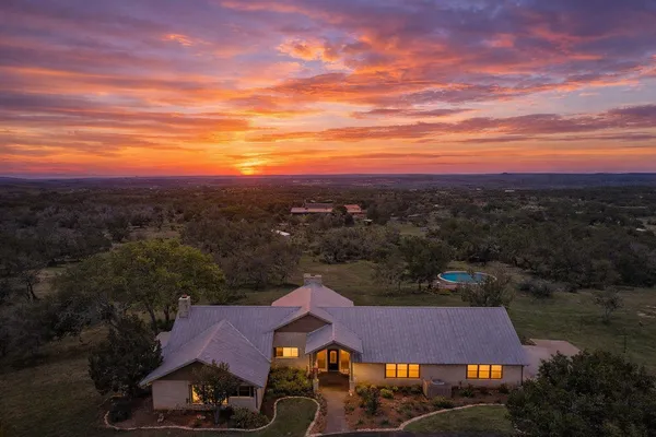 a view of a town with big tree