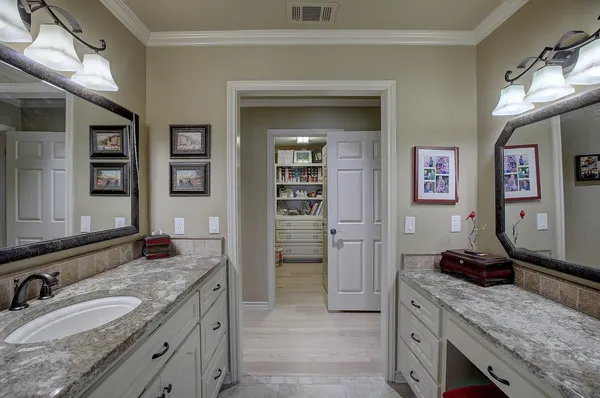 a view of a house with backyard porch and sitting area