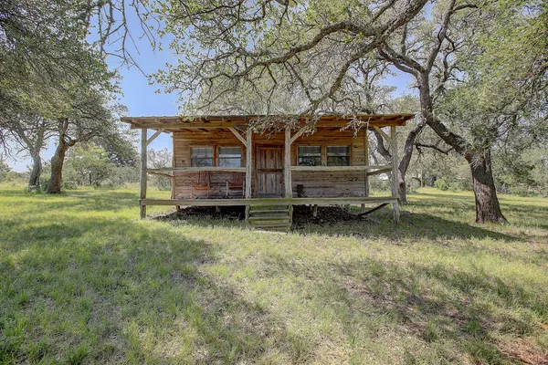 a view of a room with wooden floor outdoor seating and yard