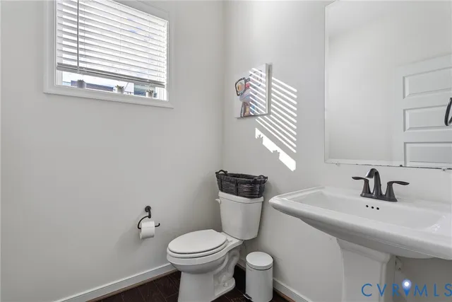 a bathroom with a sink and a toilet