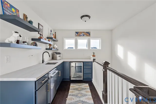 a backyard of a house with barbeque oven and outdoor seating