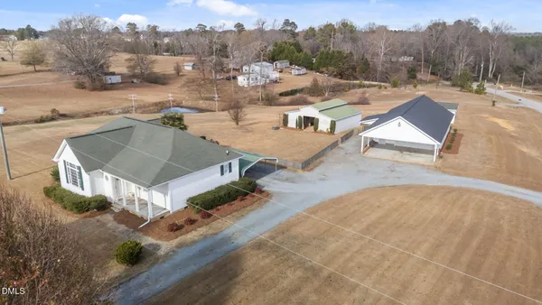 an aerial view of a house with a garden