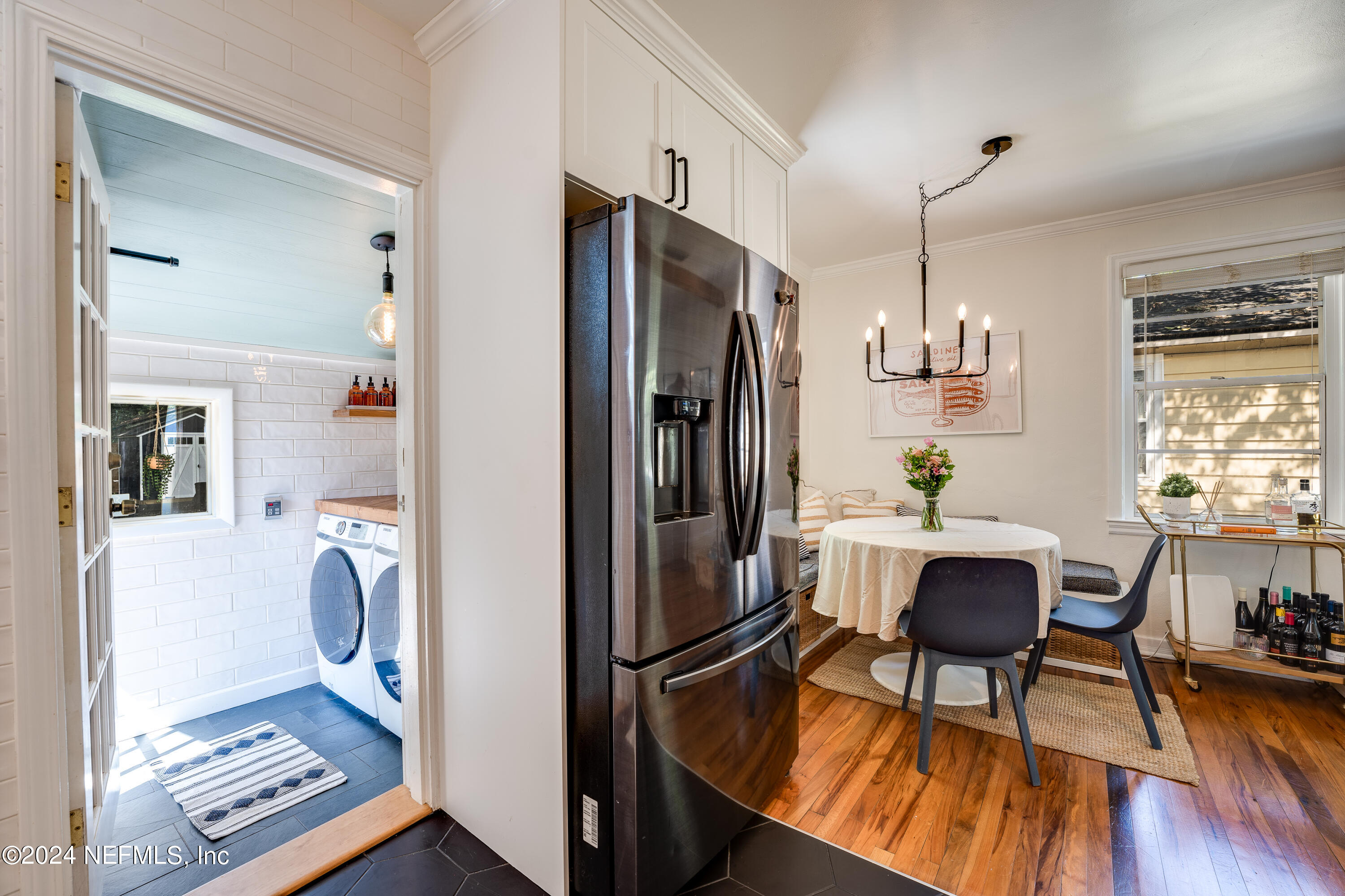 1322 Rensselaer Avenue Jacksonville, FL 32205 - Photo 17 of 37 a dining room filled with furniture and wooden floor