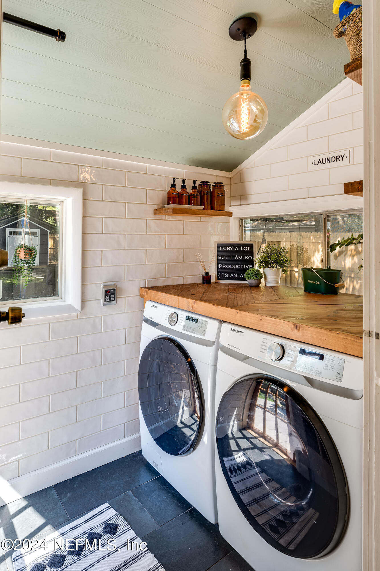 1322 Rensselaer Avenue Jacksonville, FL 32205 - Photo 18 of 37 a utility room with dryer and washer