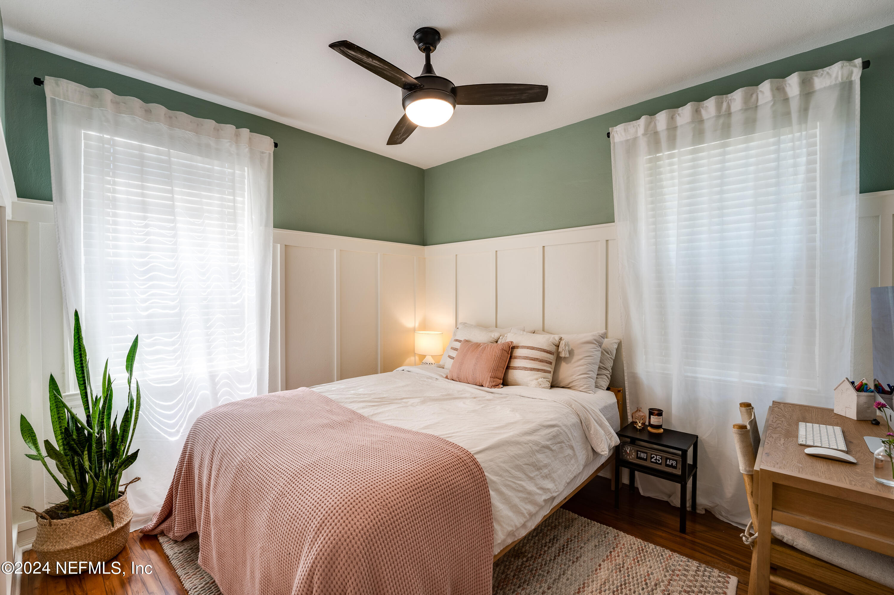 1322 Rensselaer Avenue Jacksonville, FL 32205 - Photo 22 of 37 a bedroom with a balcony a bed and a chandelier