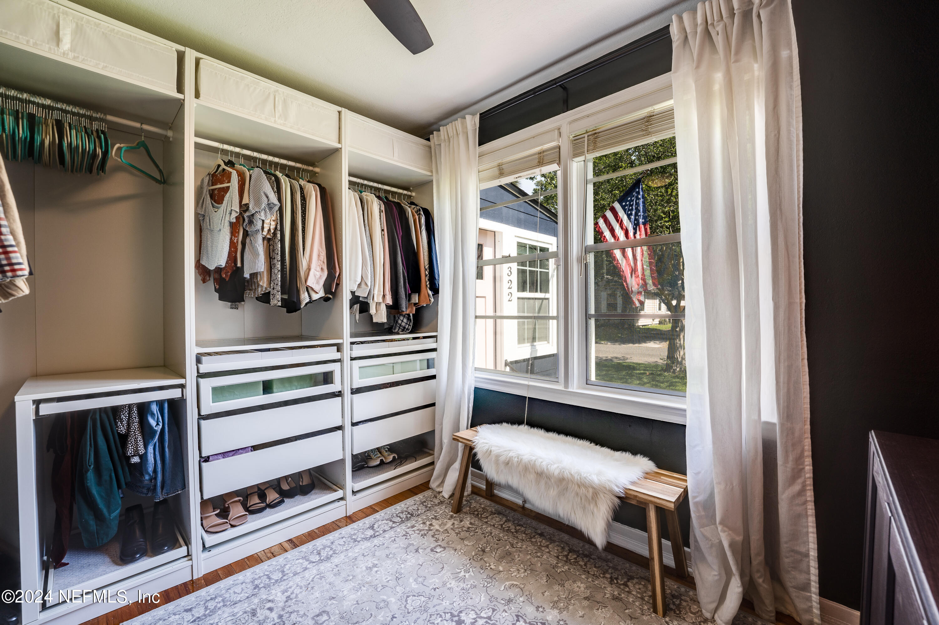 1322 Rensselaer Avenue Jacksonville, FL 32205 - Photo 24 of 37 a view of walk in closet with clothes and shoes