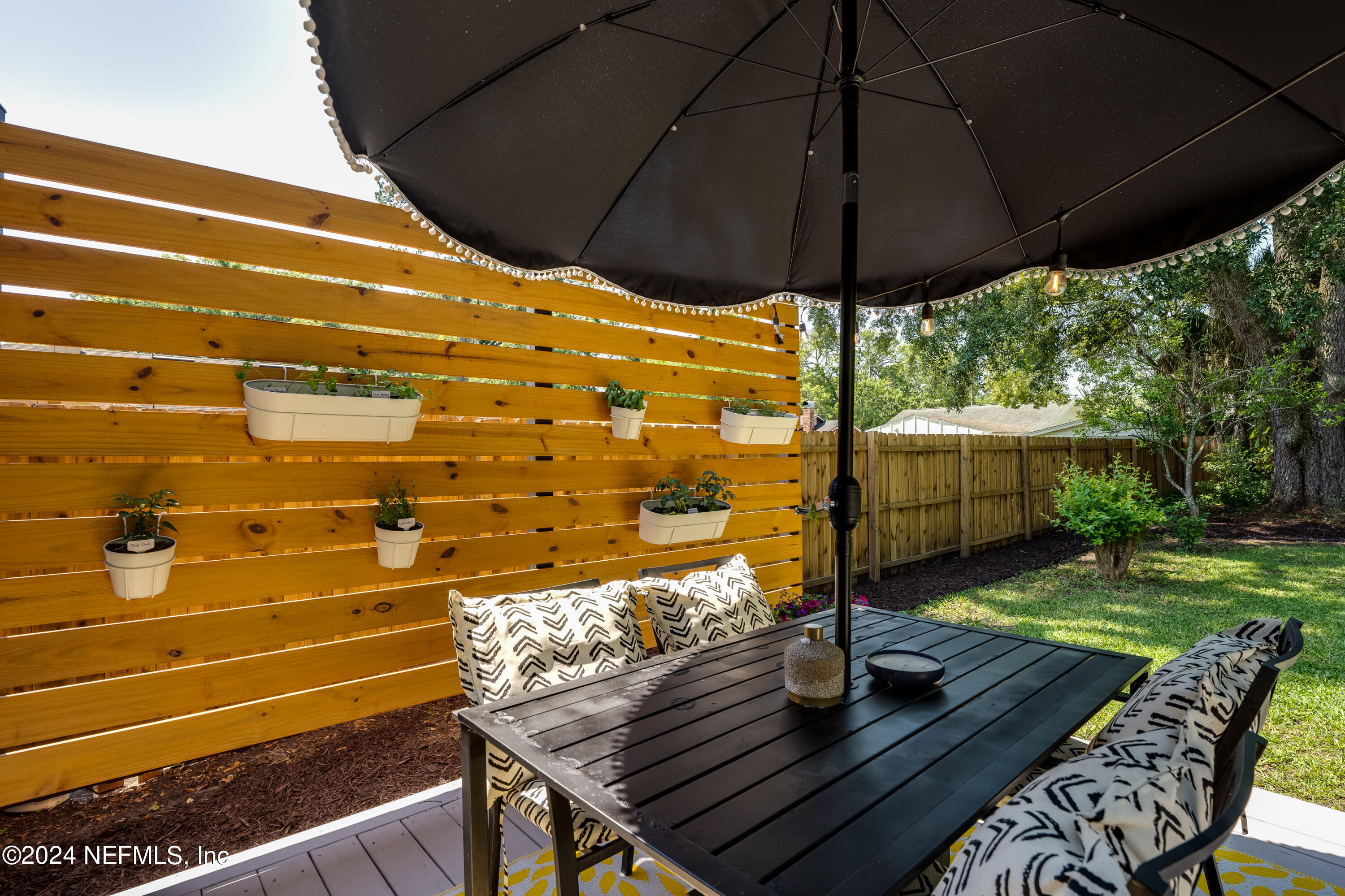 1322 Rensselaer Avenue Jacksonville, FL 32205 - Photo 32 of 37 a view of an outdoor space with swimming pool