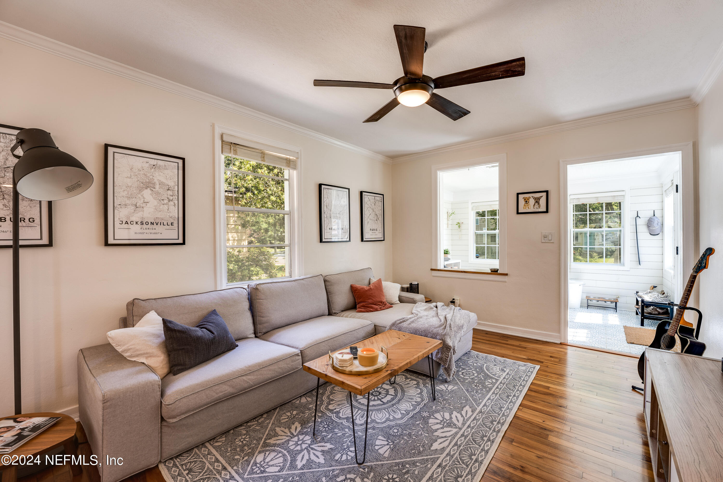 1322 Rensselaer Avenue Jacksonville, FL 32205 - Photo 9 of 37 a living room with furniture a rug and a window