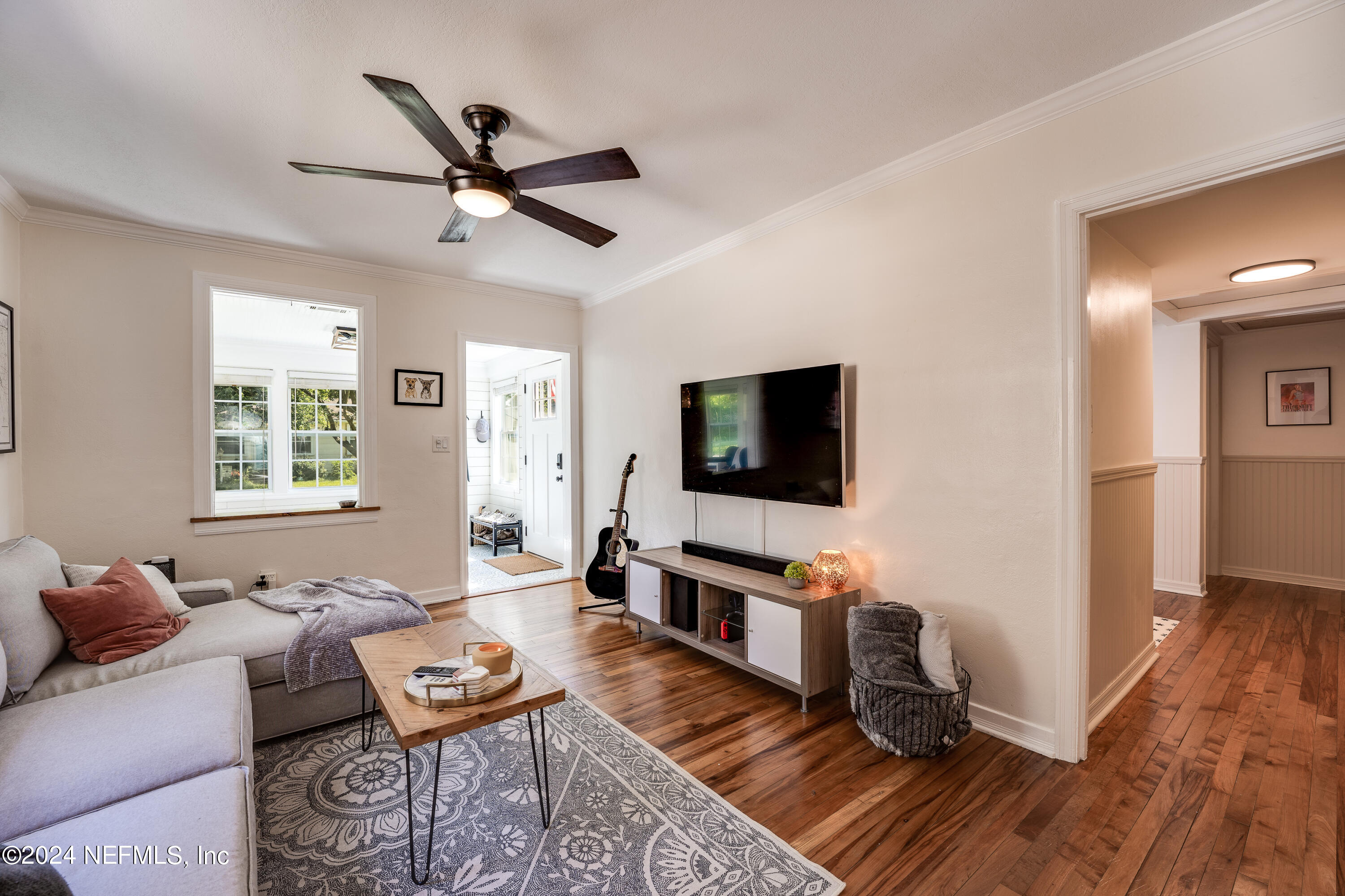 1322 Rensselaer Avenue Jacksonville, FL 32205 - Photo 10 of 37 a living room with furniture and a flat screen tv