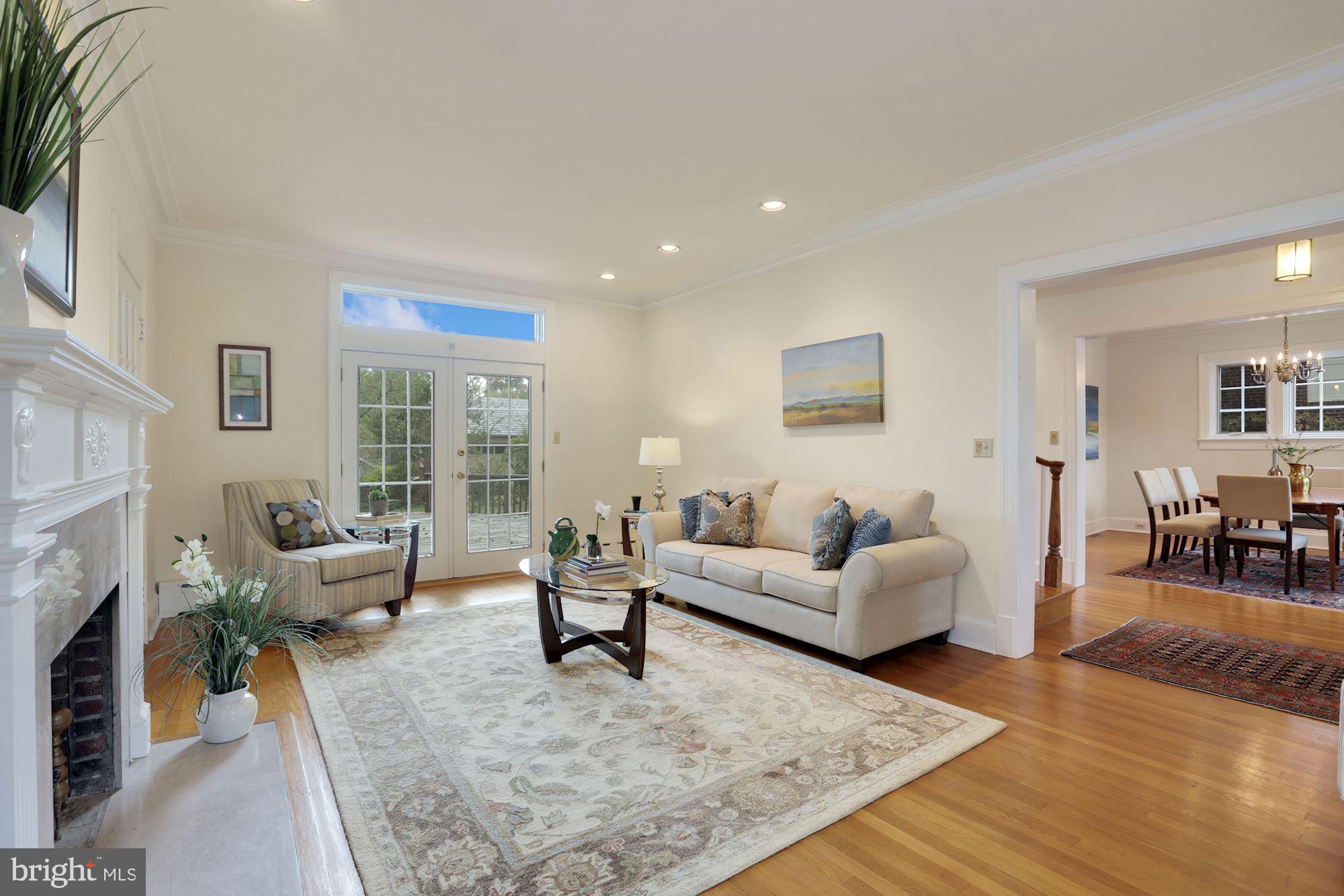 3224 Rittenhouse Street Northwest Washington, DC 20015 - Photo 5 of 30 Living room has access to rear deck & side porch