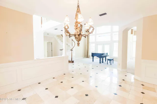a view of a living room with a large window