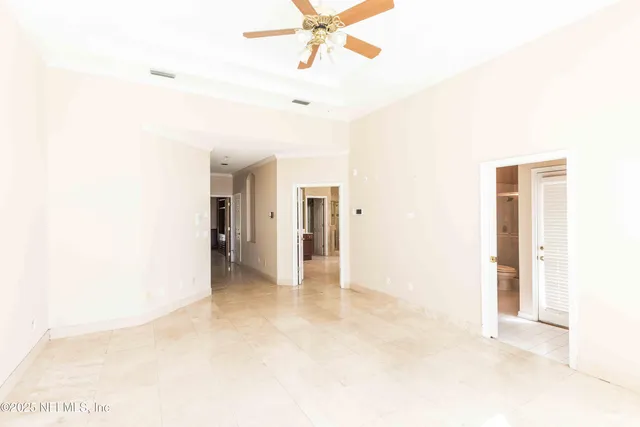 a view of a livingroom with a ceiling fan