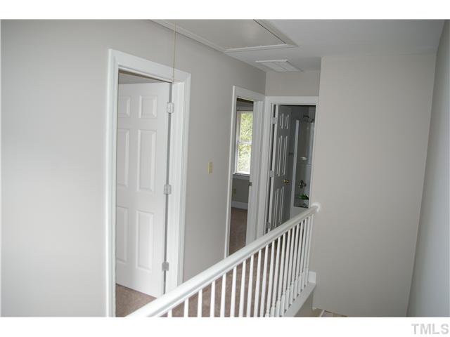 8112 Round Oak Road Raleigh, NC 27616 - Photo 13 of 18 Second level landing. New carpet and window treatments throughout the house.