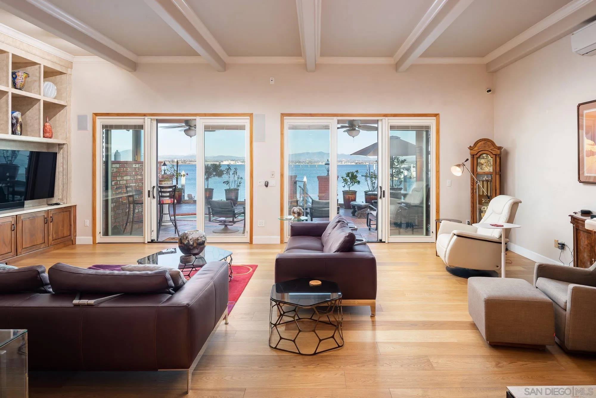5 Sandpiper Strand Coronado, CA 92118 - Photo 13 of 70 a living room with furniture and a flat screen tv