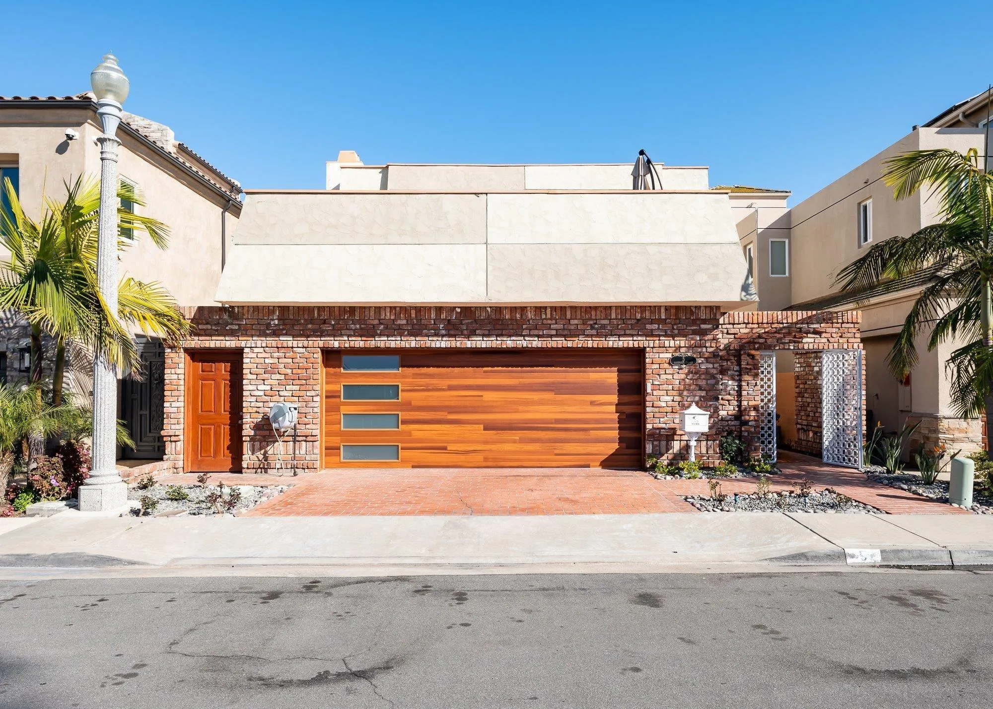 5 Sandpiper Strand Coronado, CA 92118 - Photo 2 of 70 a front view of a building with a road