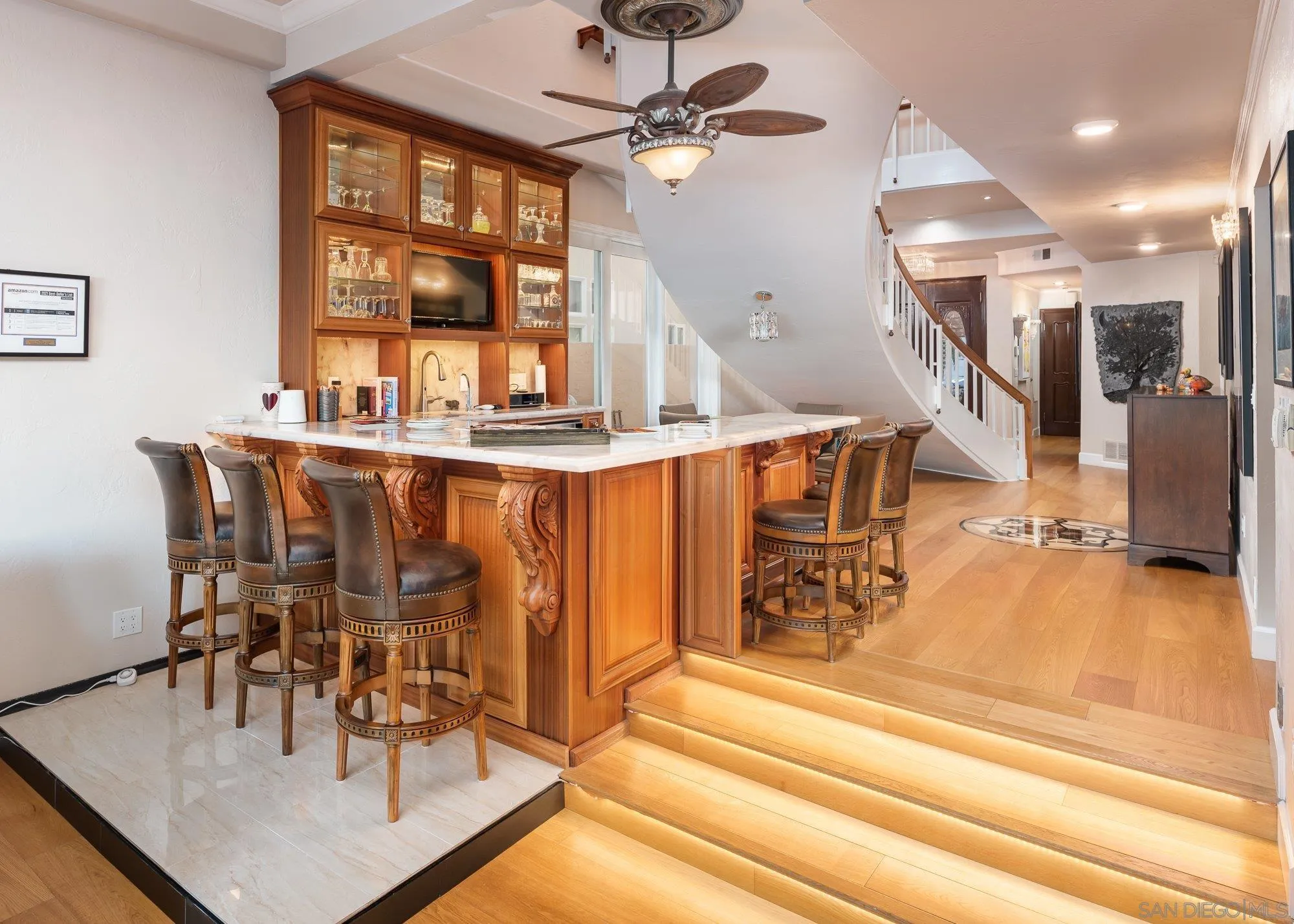 5 Sandpiper Strand Coronado, CA 92118 - Photo 26 of 70 a dining hall with stainless steel appliances granite countertop a dining table chairs and chandelier