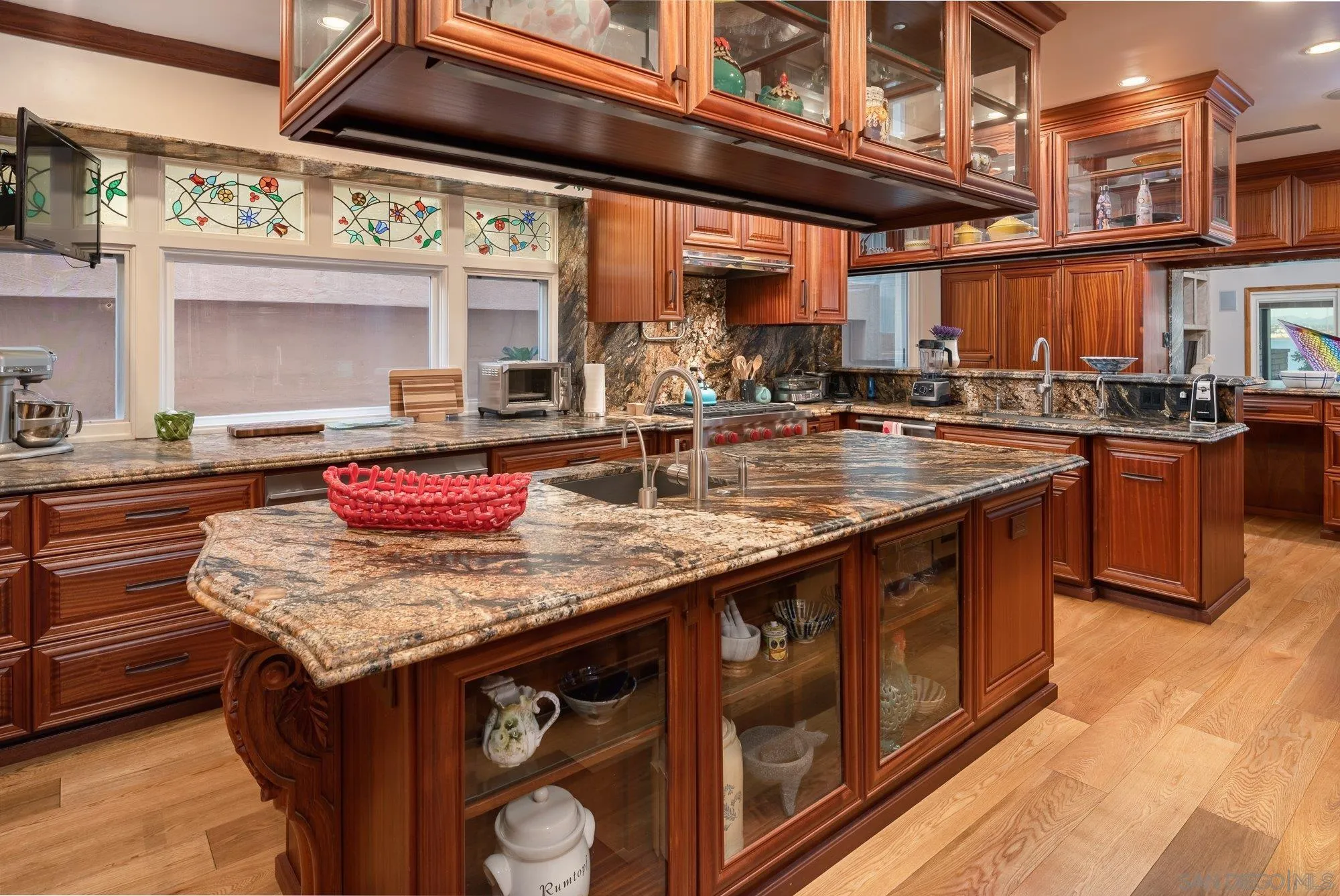5 Sandpiper Strand Coronado, CA 92118 - Photo 32 of 70 a kitchen with stainless steel appliances granite countertop a sink stove and cabinets