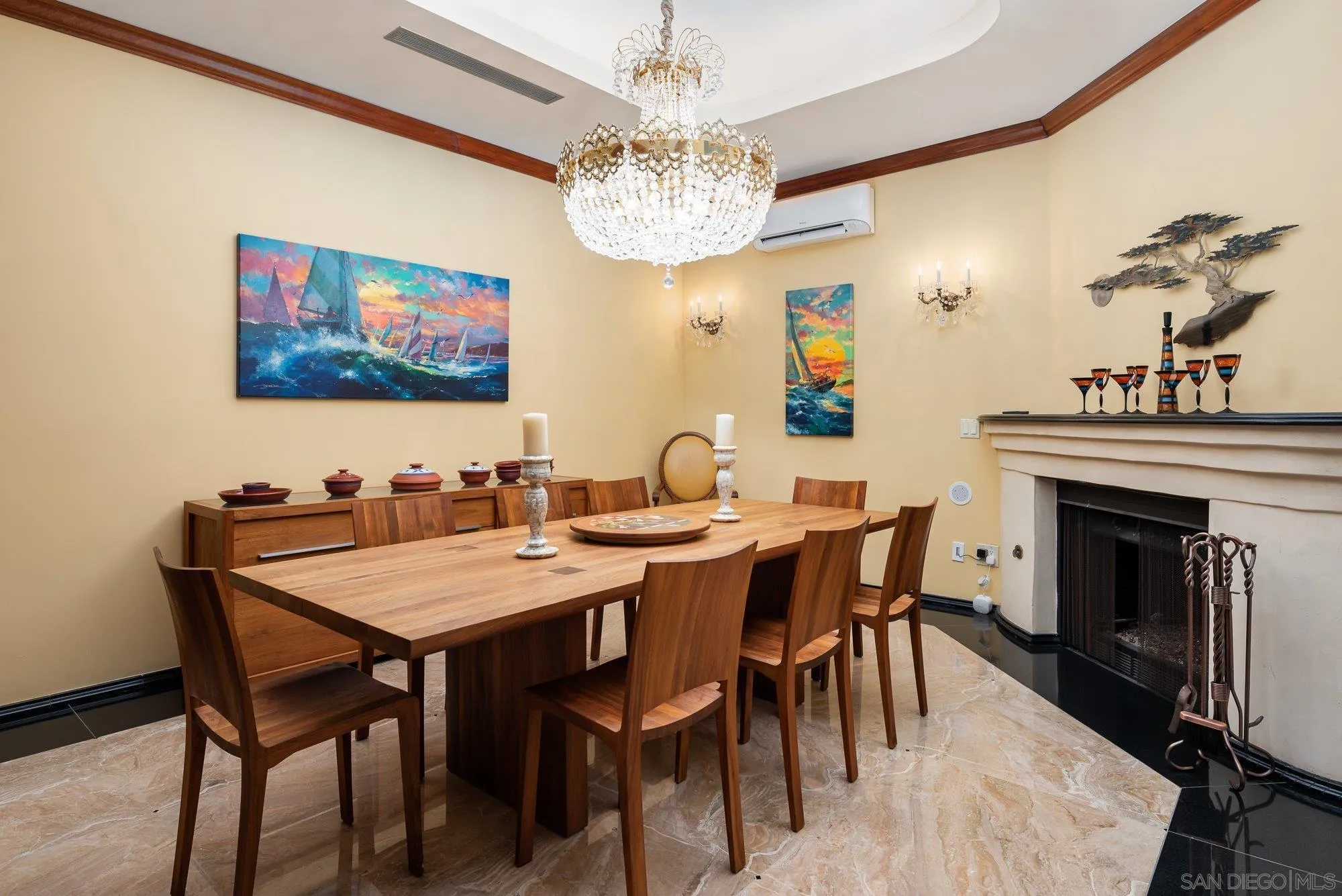 5 Sandpiper Strand Coronado, CA 92118 - Photo 34 of 70 a view of a dining room with furniture a chandelier and wooden floor