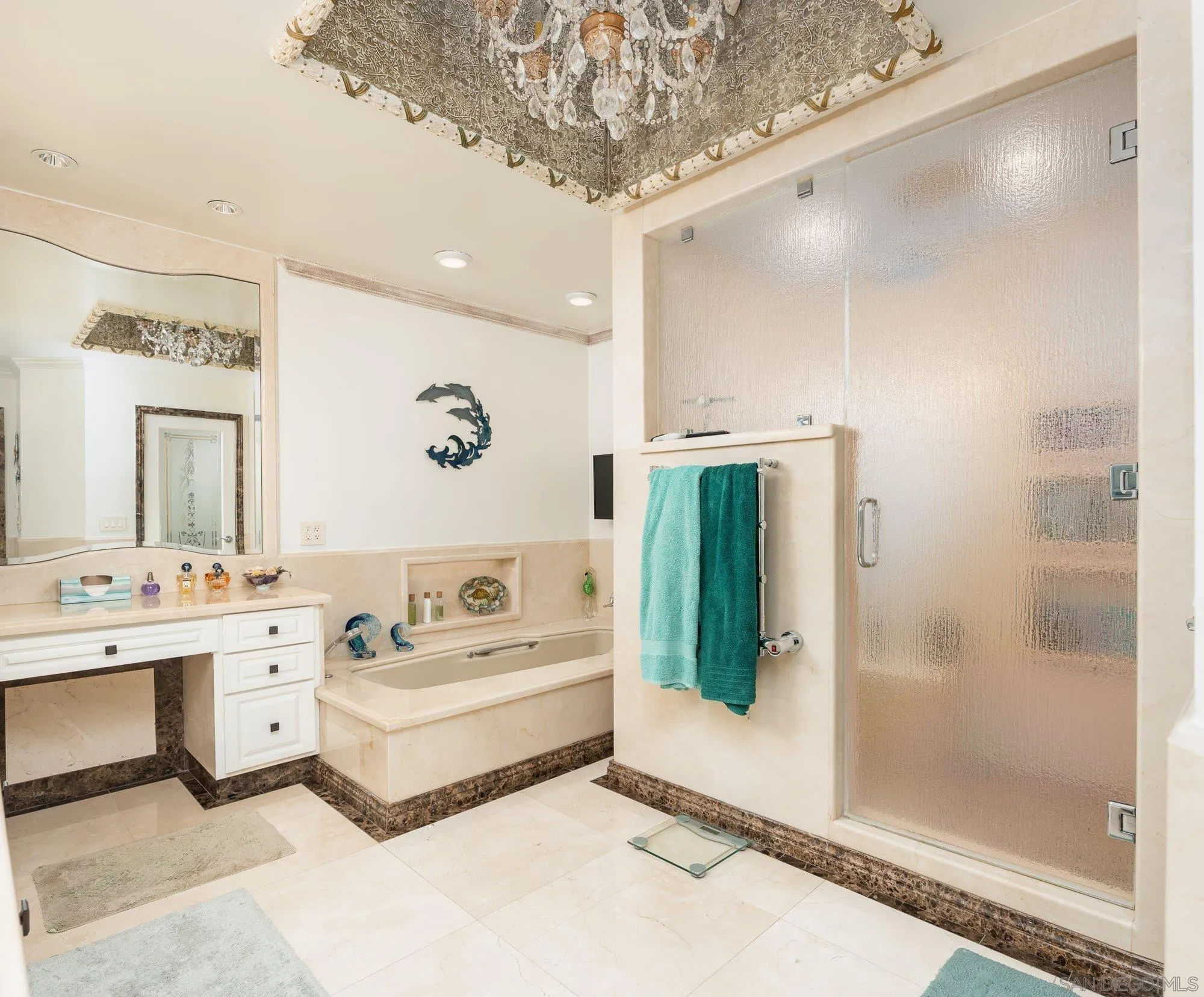 5 Sandpiper Strand Coronado, CA 92118 - Photo 47 of 70 a spacious bathroom with a double vanity sink a large mirror and shower