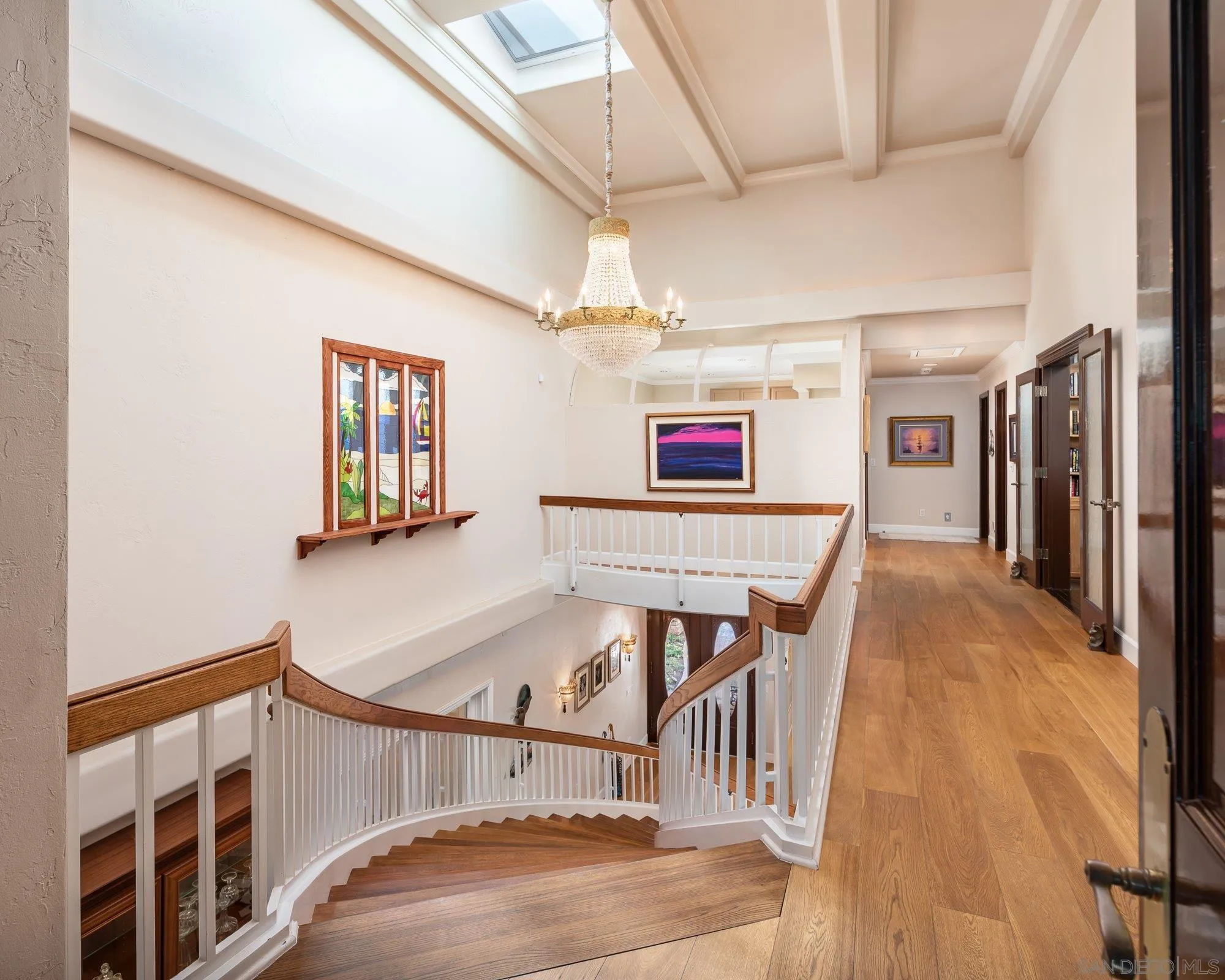 5 Sandpiper Strand Coronado, CA 92118 - Photo 49 of 70 a view of a hallway with a dining table chairs