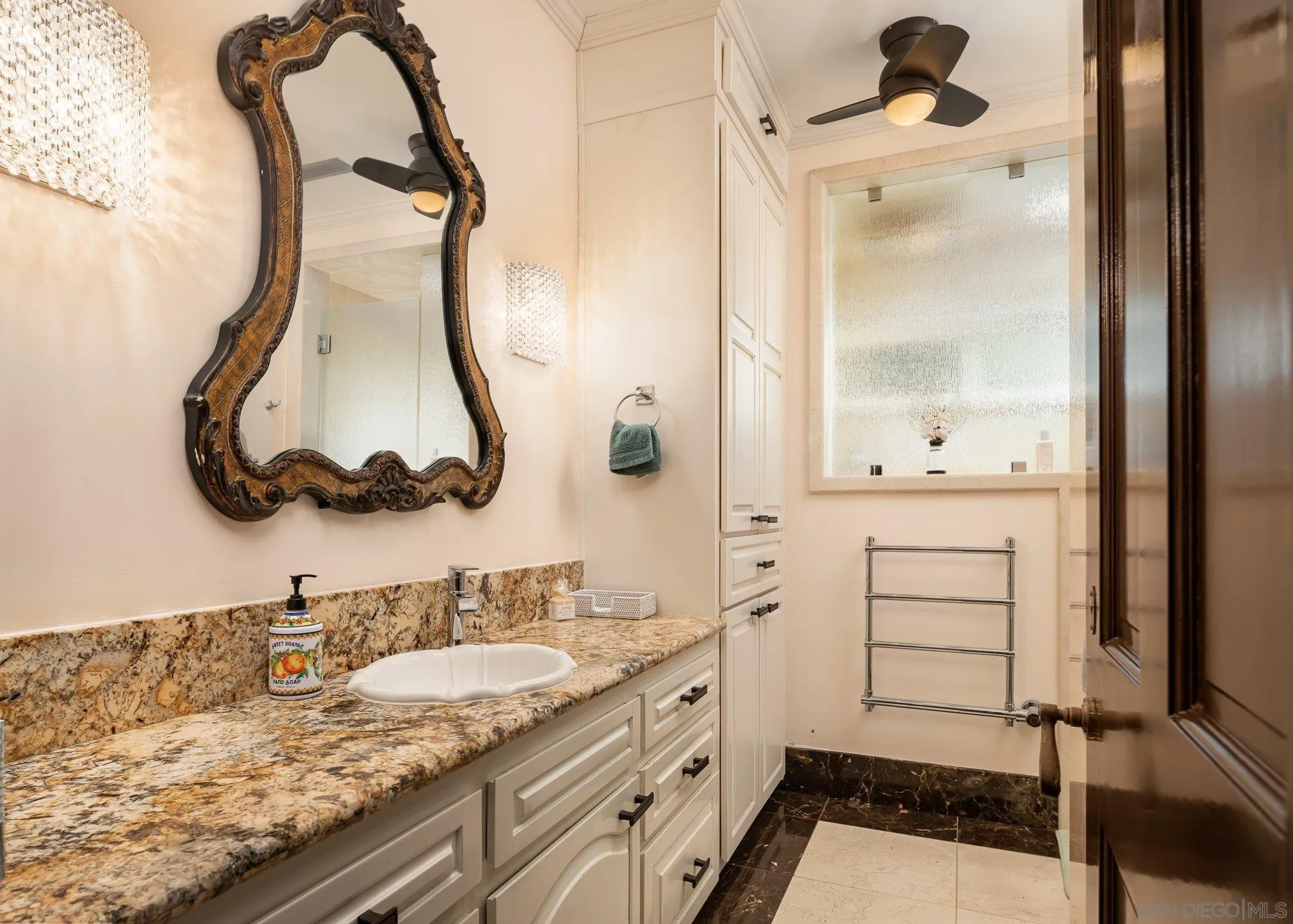 5 Sandpiper Strand Coronado, CA 92118 - Photo 53 of 70 a bathroom with a granite countertop sink mirror and a shower