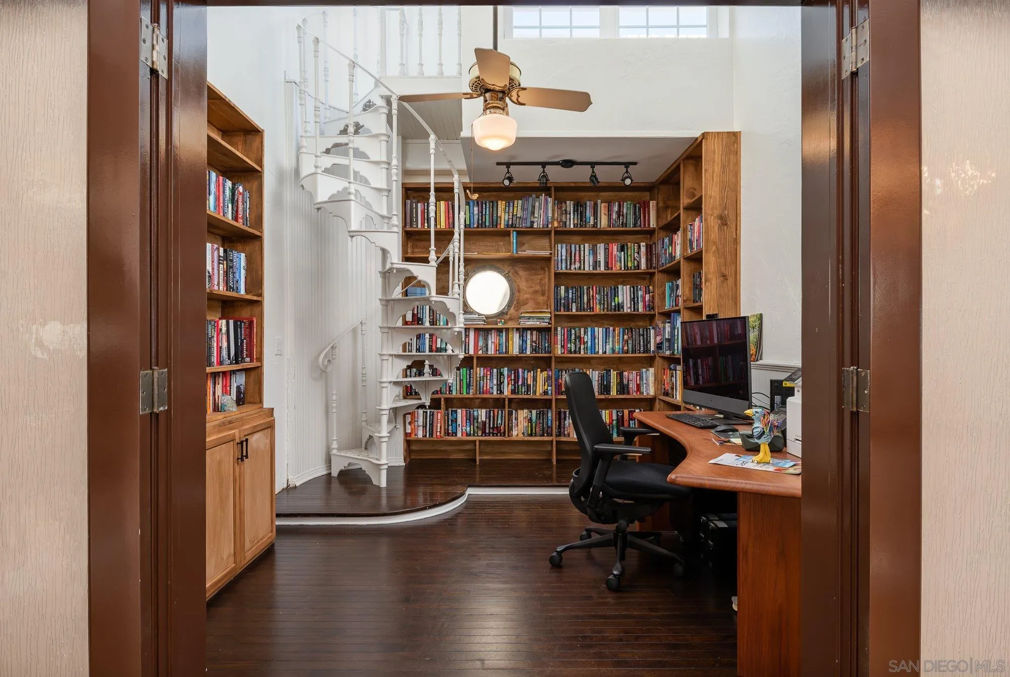 5 Sandpiper Strand Coronado, CA 92118 - Photo 55 of 70 a view of a workspace with furniture and cabinet