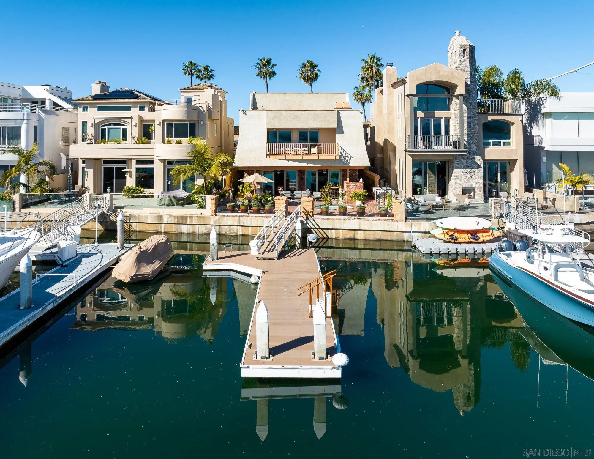 5 Sandpiper Strand Coronado, CA 92118 - Photo 58 of 70 a front view of multiple houses with outdoor seating