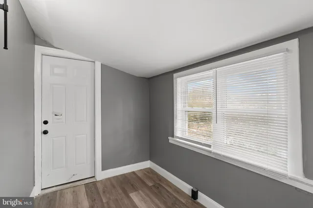 a view of a room that has a window in it