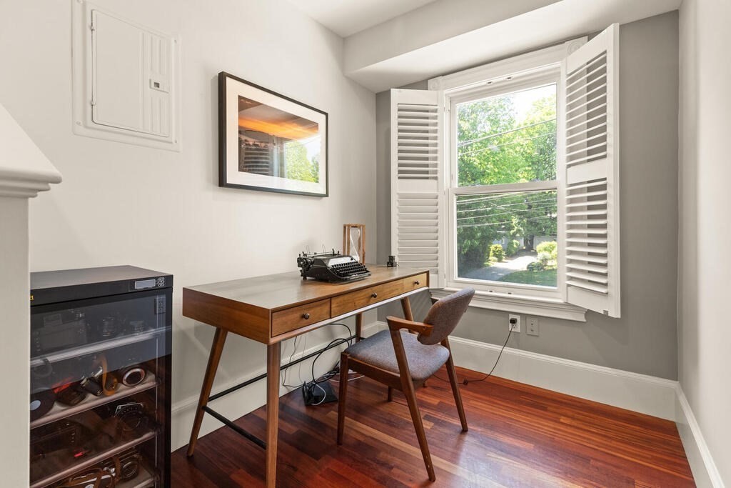 22 Fletcher Street, Unit 22 Winchester, MA 01890 - Photo 16 of 31 a view of a workspace with furniture and a window