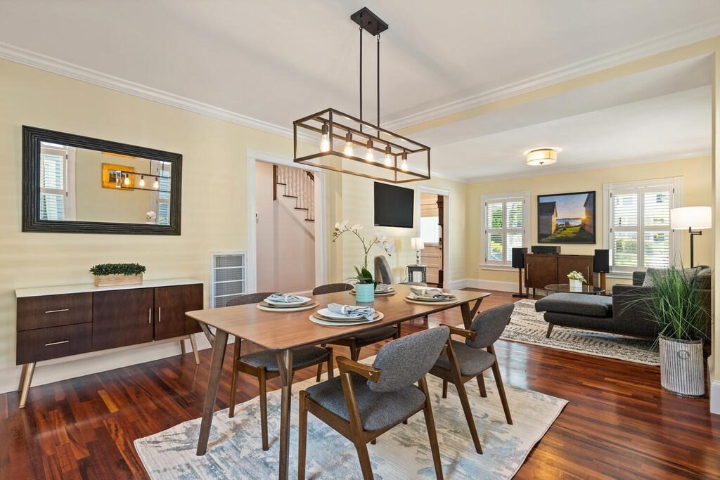 22 Fletcher Street, Unit 22 Winchester, MA 01890 - Photo 3 of 31 a view of a dining room with furniture window and wooden floor