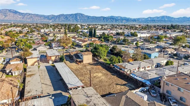 an aerial view of residential house with an outdoor space