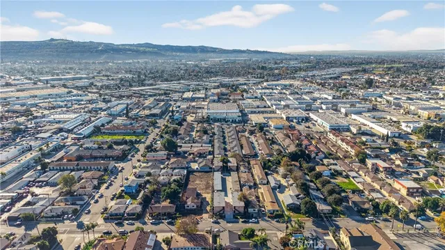 an aerial view of residential building and trees