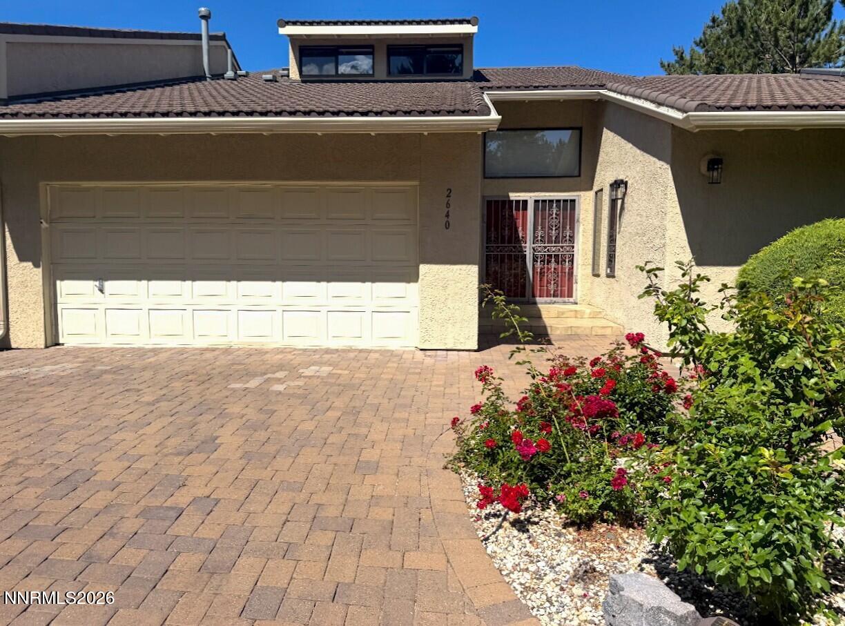 2640 Rockview Drive Reno, NV 89519 - Photo 1 of 56 a front view of a house with a yard