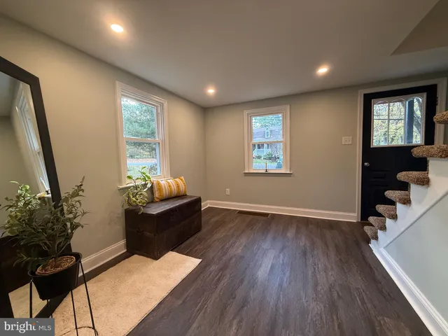 a room with furniture and window