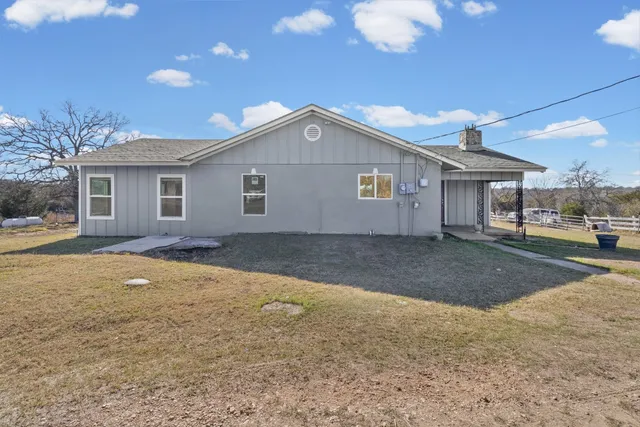 a view of backyard of house