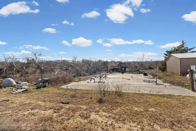 a view of an ocean beach and city