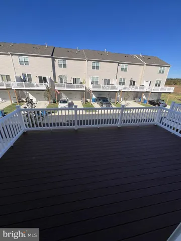 a view of a balcony with an ocean view