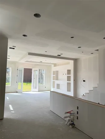 an empty room with windows