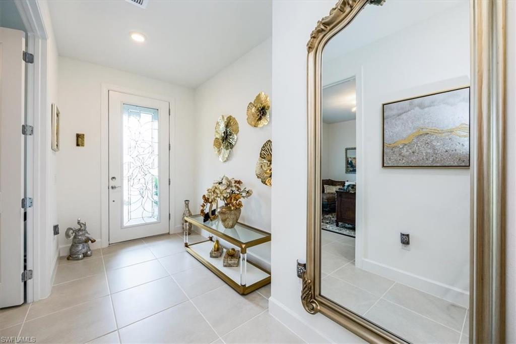 10499 Ventana Lane Naples, FL 34120 - Photo 3 of 22 Gorgeous new after market pool and spa
