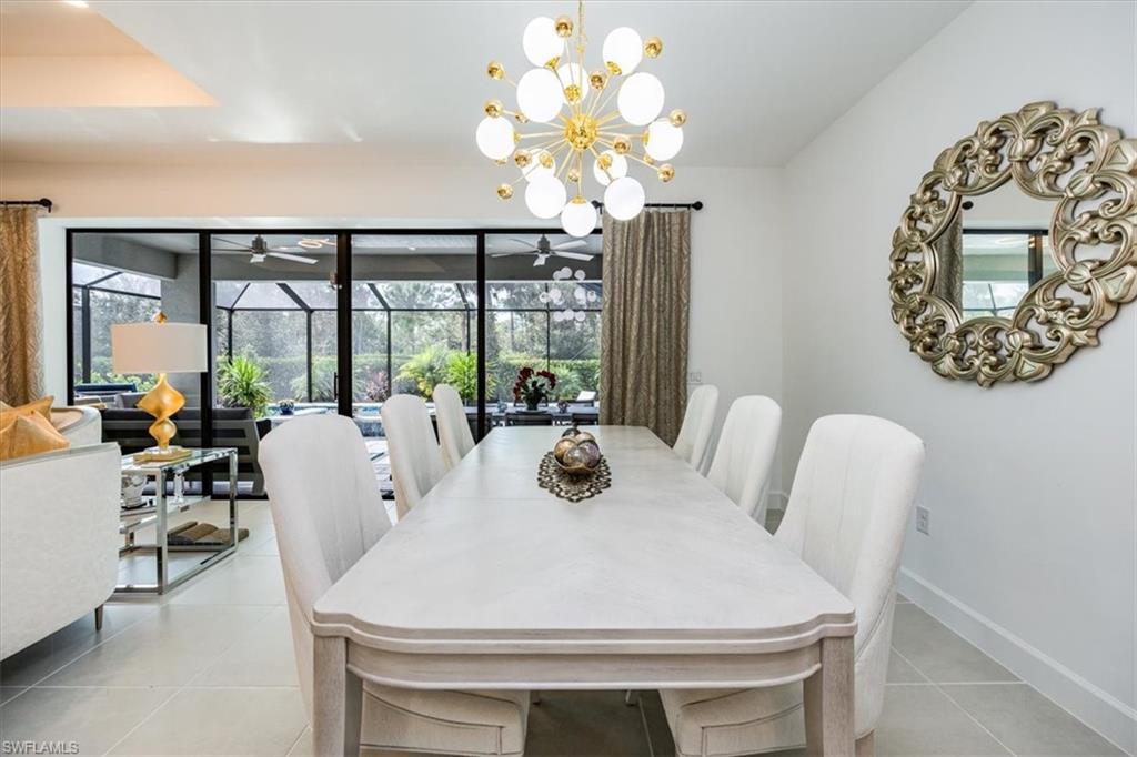10499 Ventana Lane Naples, FL 34120 - Photo 7 of 22 Spacious great room with open concept to kitchen