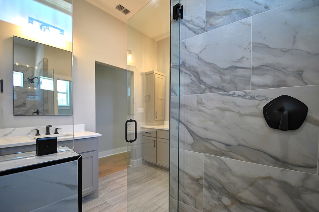 513 Conner Court Kerrville, TX 78028 - Photo 27 of 54 a bathroom with a sink and a mirror