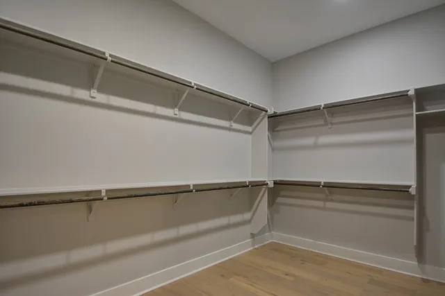 a view of an empty walk in closet