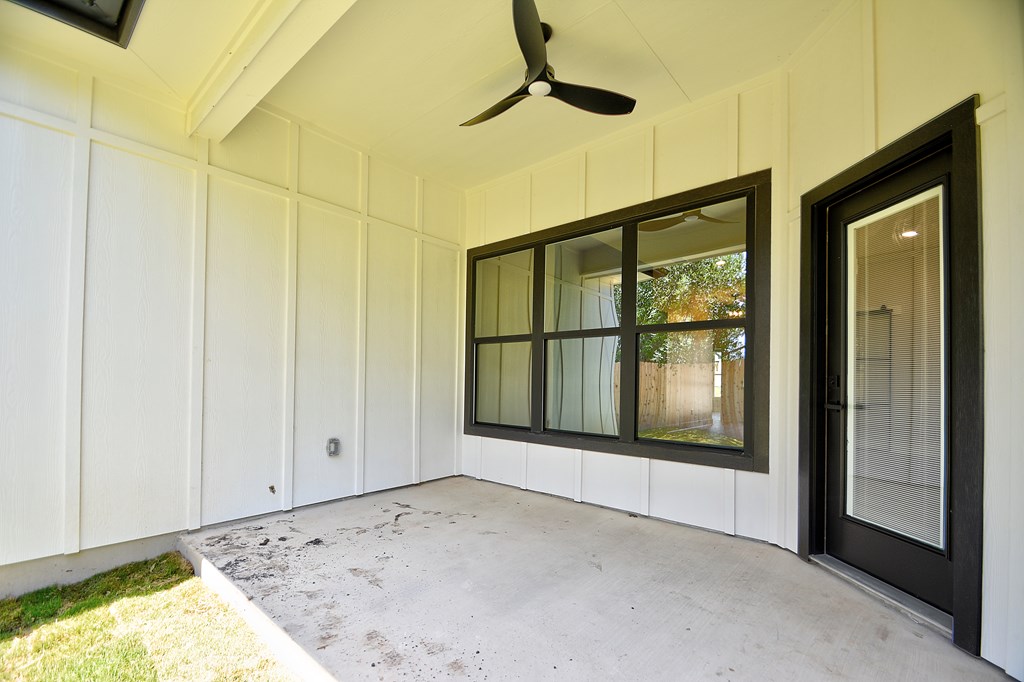 513 Conner Court Kerrville, TX 78028 - Photo 45 of 54 a view of an empty room with a fireplace and a window