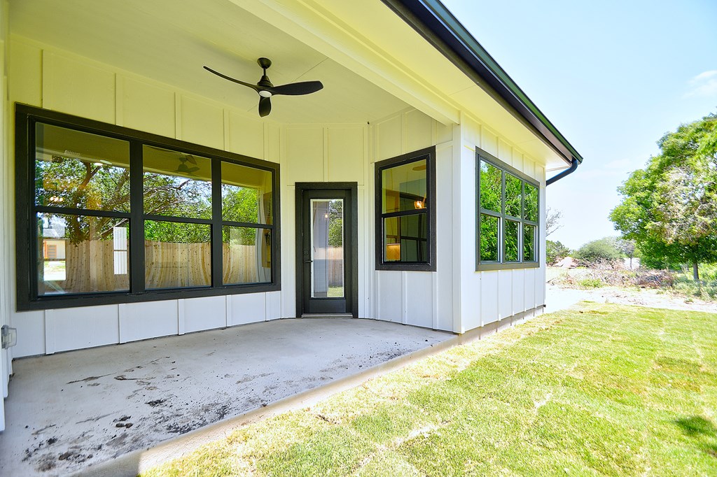 513 Conner Court Kerrville, TX 78028 - Photo 47 of 54 a view of porch with a floor to ceiling windows and yard