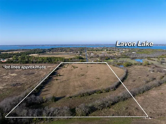 a view of a swimming pool with a balcony