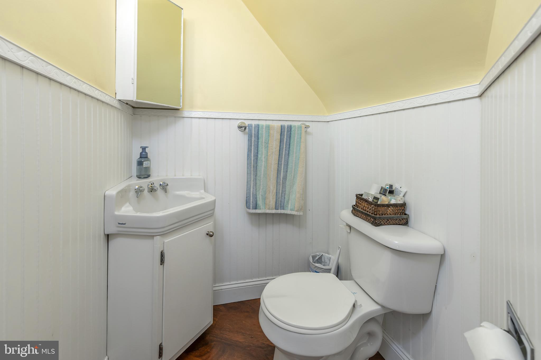303 Main Street Mantua, NJ 08051 - Photo 19 of 50 a bathroom with a sink toilet and a mirror
