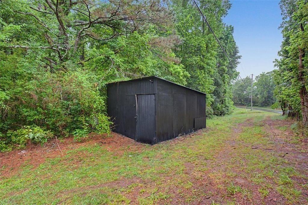 360 Black Knob Church Road Ranger, GA 30734 - Photo 17 of 20 a view of a backyard of the house