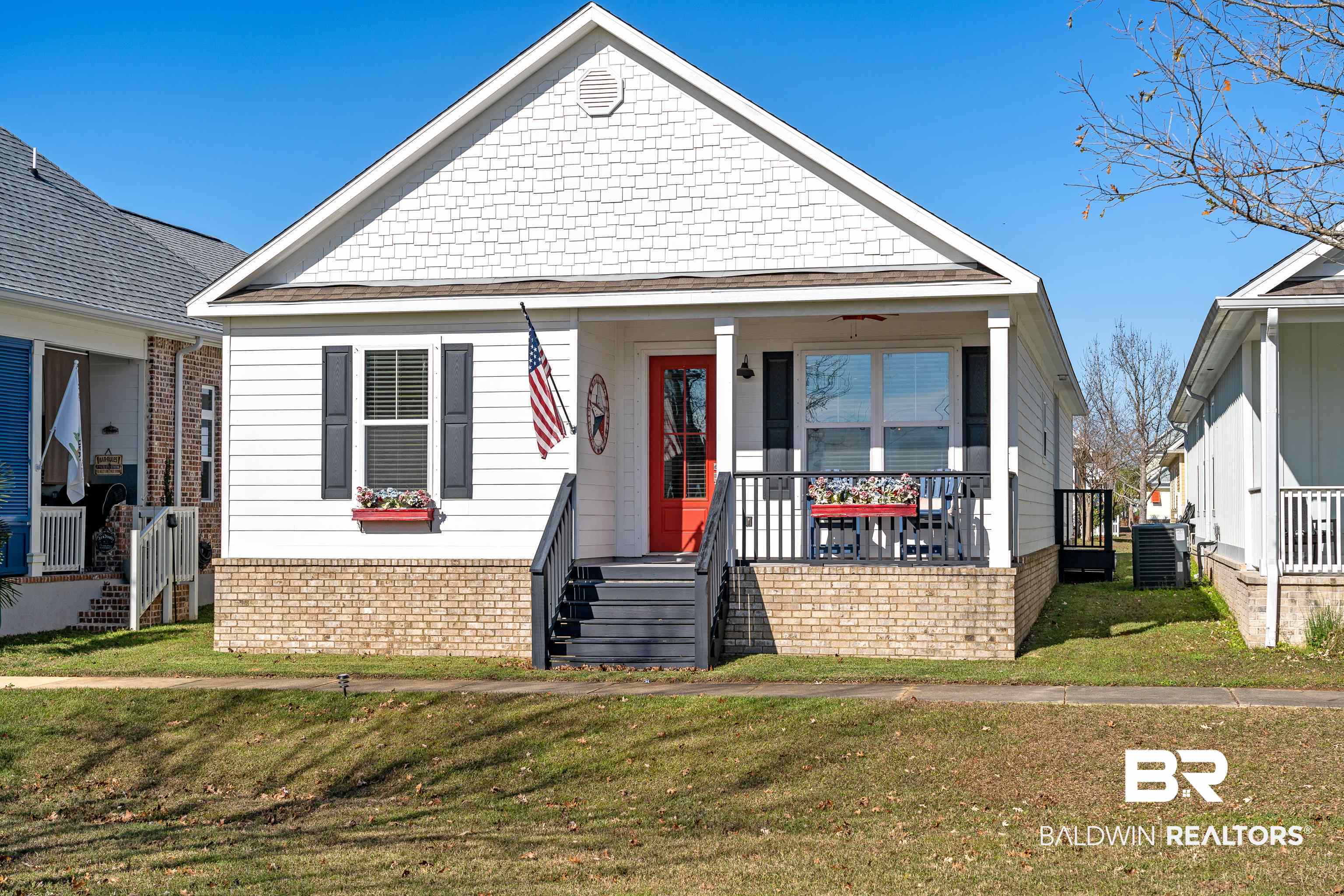 1018 Snapdragon Lane Foley, AL 36535 - Photo 1 of 37 Bungalow-style house with cooling unit, a porch, and a front lawn