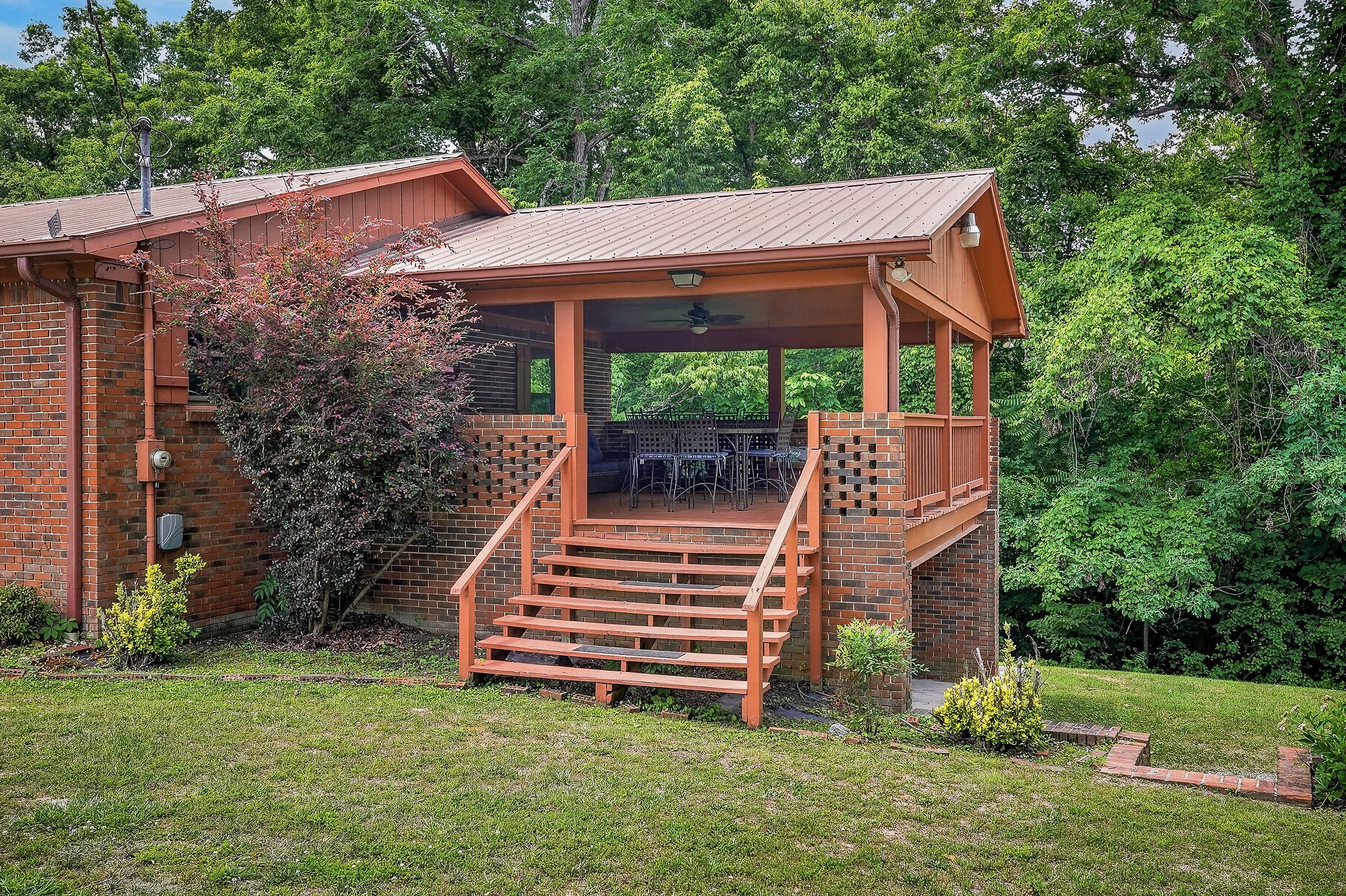 5642 Pates Ford Road Smithville, TN 37166 - Photo 29 of 32 a view of a house with backyard and a hammock