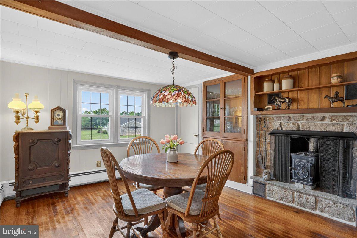 443 Baptist Church Road Spring City, PA 19475 - Photo 13 of 37 Quaint dining area with built-ins & wood stove